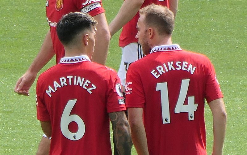 martinez and eriksen playing for man united showing backs of shirt names and numbers